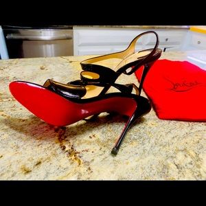 Christian Louboutin Black Patent Leather strapped Stiletto Sandler. Brand New
